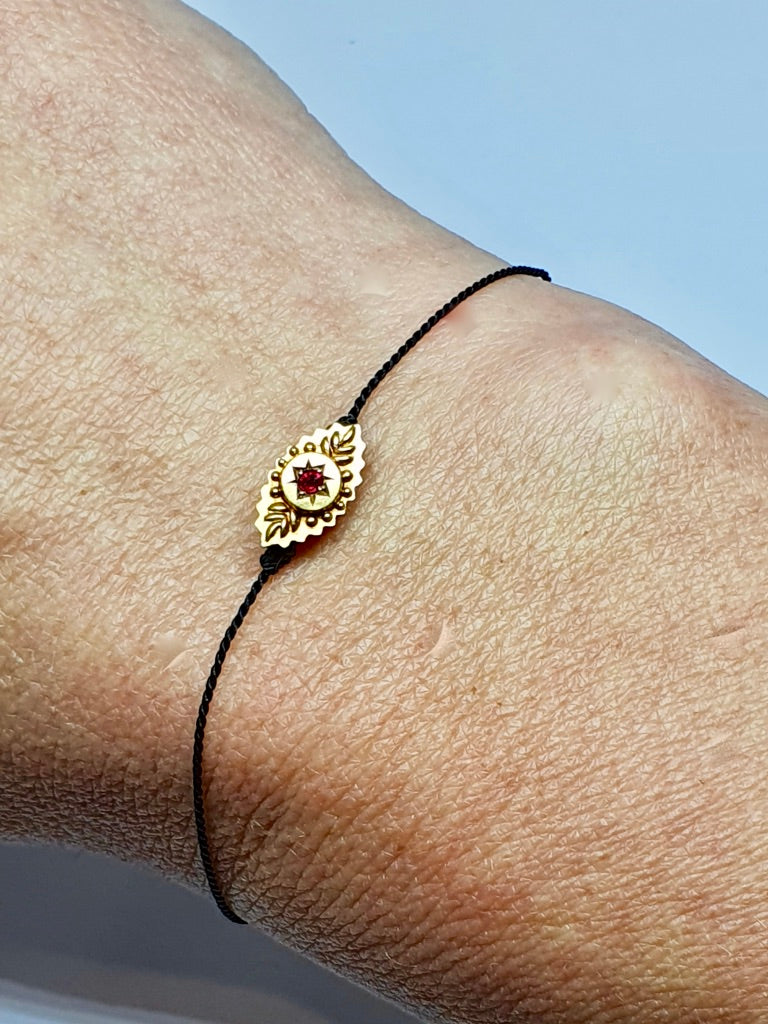 9 carat Gold Victorian lozenge shaped bracelet set with a Ruby