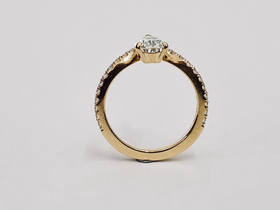 'The Carrie' 18 Carat Yellow Gold Pear Shaped Diamond Engagement Ring and Matching Wedding Ring