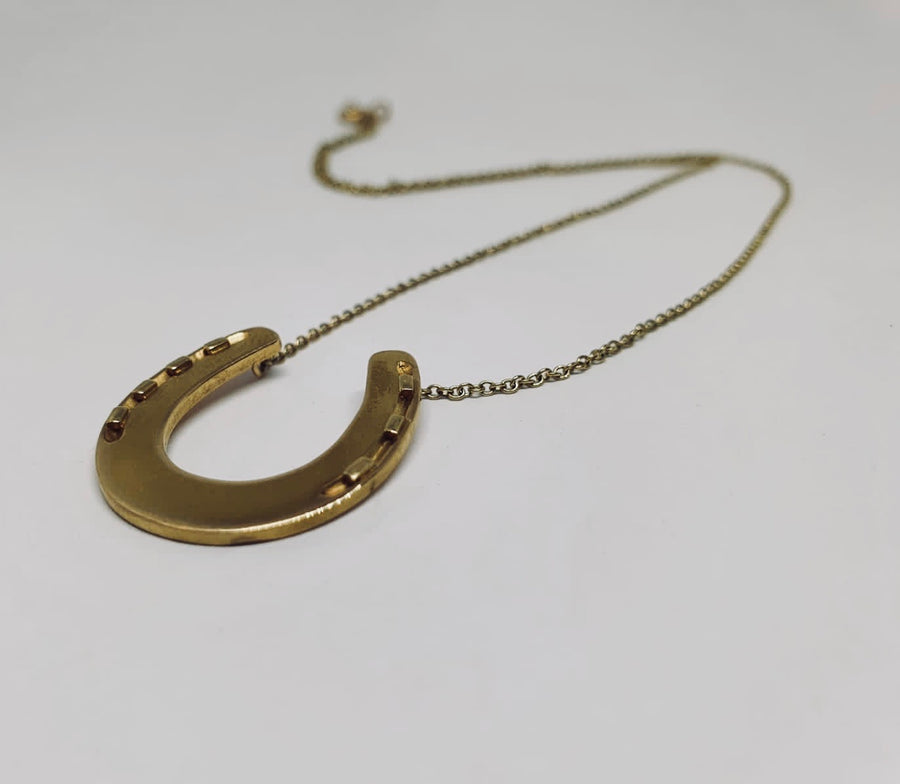 Gold horse-shoe necklace