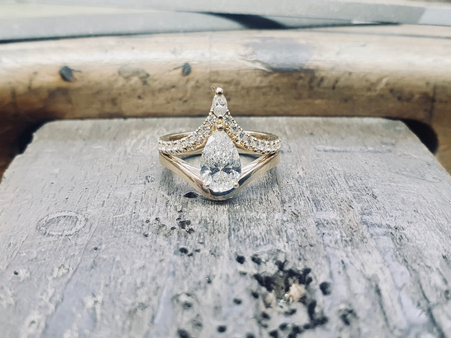 'The Carrie' 18 Carat Yellow Gold Pear Shaped Diamond Engagement Ring and Matching Wedding Ring