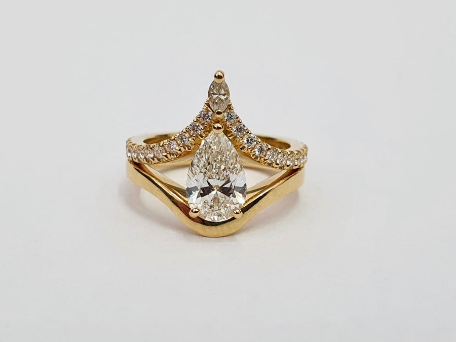 'The Carrie' 18 Carat Yellow Gold Pear Shaped Diamond Engagement Ring and Matching Wedding Ring