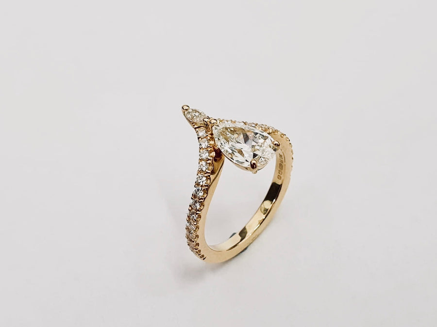 'The Carrie' 18 Carat Yellow Gold Pear Shaped Diamond Engagement Ring and Matching Wedding Ring